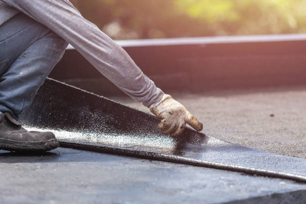 Professional Basement Waterproofing technician working in Elizabeth, PA